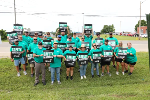 Menard Correctional Employees protest with signs saying "Our Safety Matters."