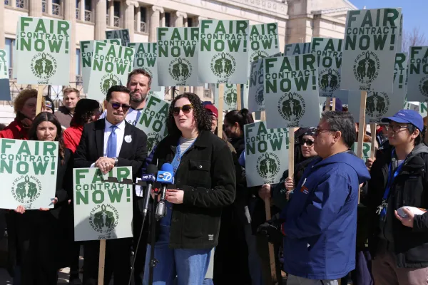 Field Museum workers hold a rally