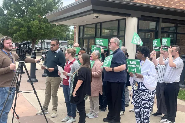 Champaign County employees announce the results of their strike vote in May 2025.
