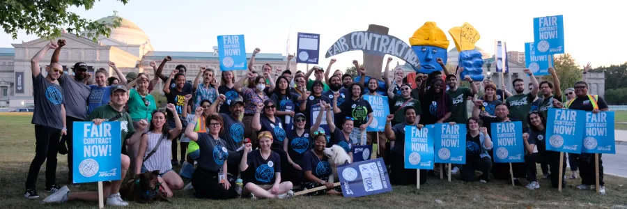 Museum of Science and Industry employees outside the museum.