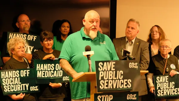 Jared Harshman speaks while Rep. Sorensen looks on.